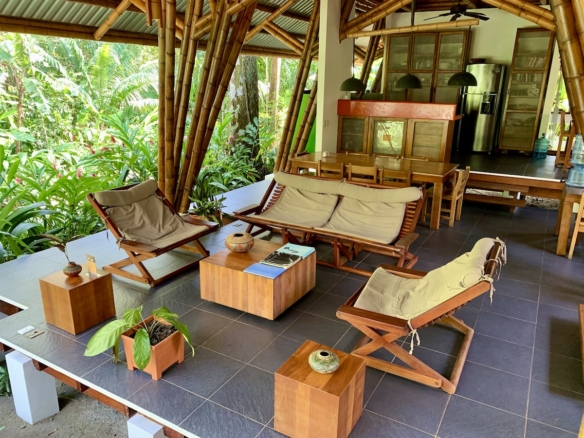 Open-concept living room with bamboo architecture
