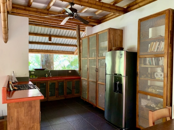 Spacious bamboo kitchen with dining area