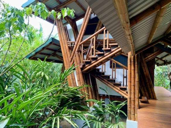 Communal space in eco-lodge with tropical decor