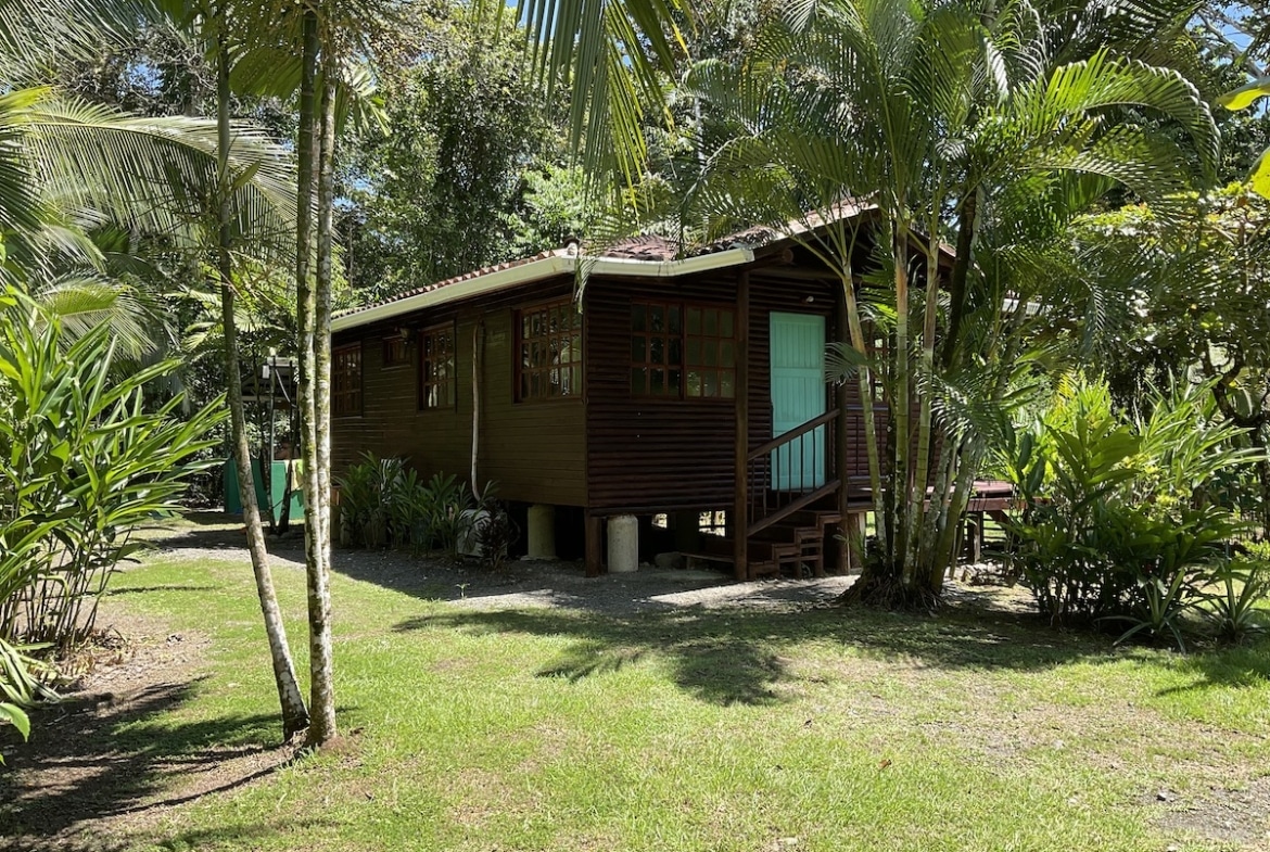 Private residence with gravel driveway and garden. 