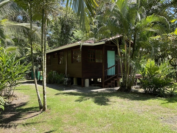 Private residence with gravel driveway and garden. 