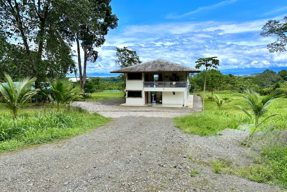 Private 5-acre Puerto Jiménez real estate with mountain and jungle backdrop