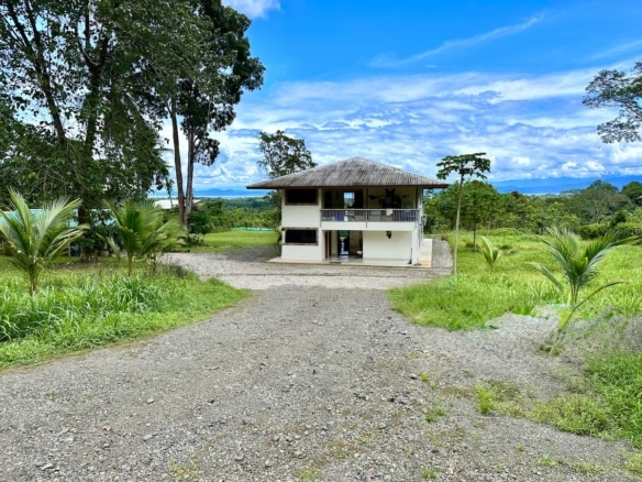 Private 5-acre Puerto Jiménez real estate with mountain and jungle backdrop