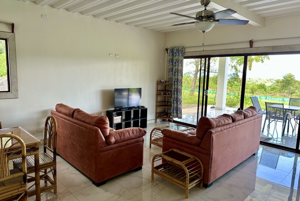 Bright interior of Osa Peninsula property with natural light